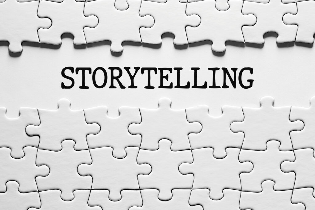 The word storytelling between the jigsaw puzzle pieces. Communication concept.